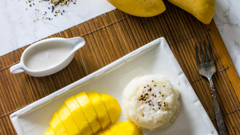 https://www.wokandskillet.com/wp-content/uploads/2018/10/thai-mango-with-sticky-rice-new-2-480x270.jpg