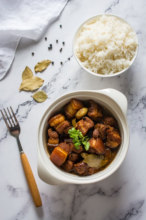 pork belly adobo with steamed rice overhead shot