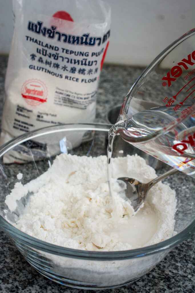 pouring water into glutinous rice flour