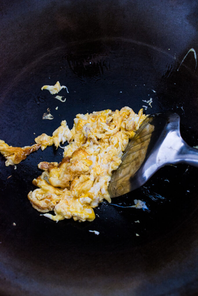 scrambling eggs in a wok